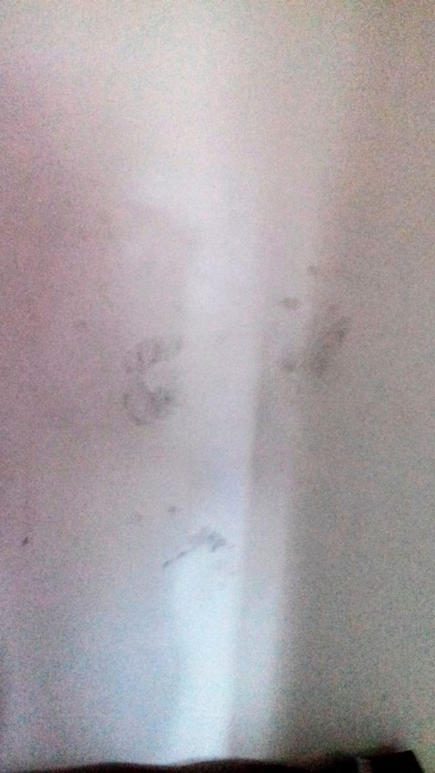 PAY-FAMILY-TORMENTED-BY-CHILD-GHOST-IN-SUICIDE-HOUSE-WHO-LEAVES-BLACK-HANDPRINTS-ON-WALLS (1)